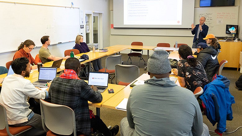 students in EPoL classroom with professor teaching