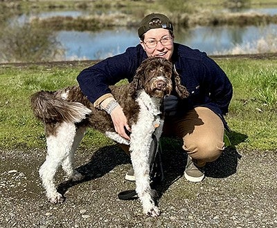 Rachel Sherman and her dog posing for the camera